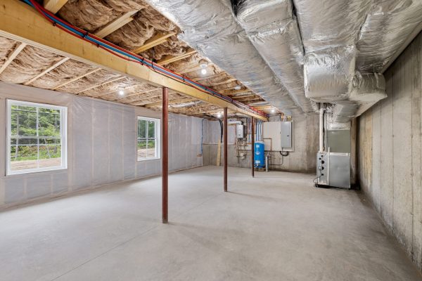 An interior of a semi-finished building in the process of renovation with equipment